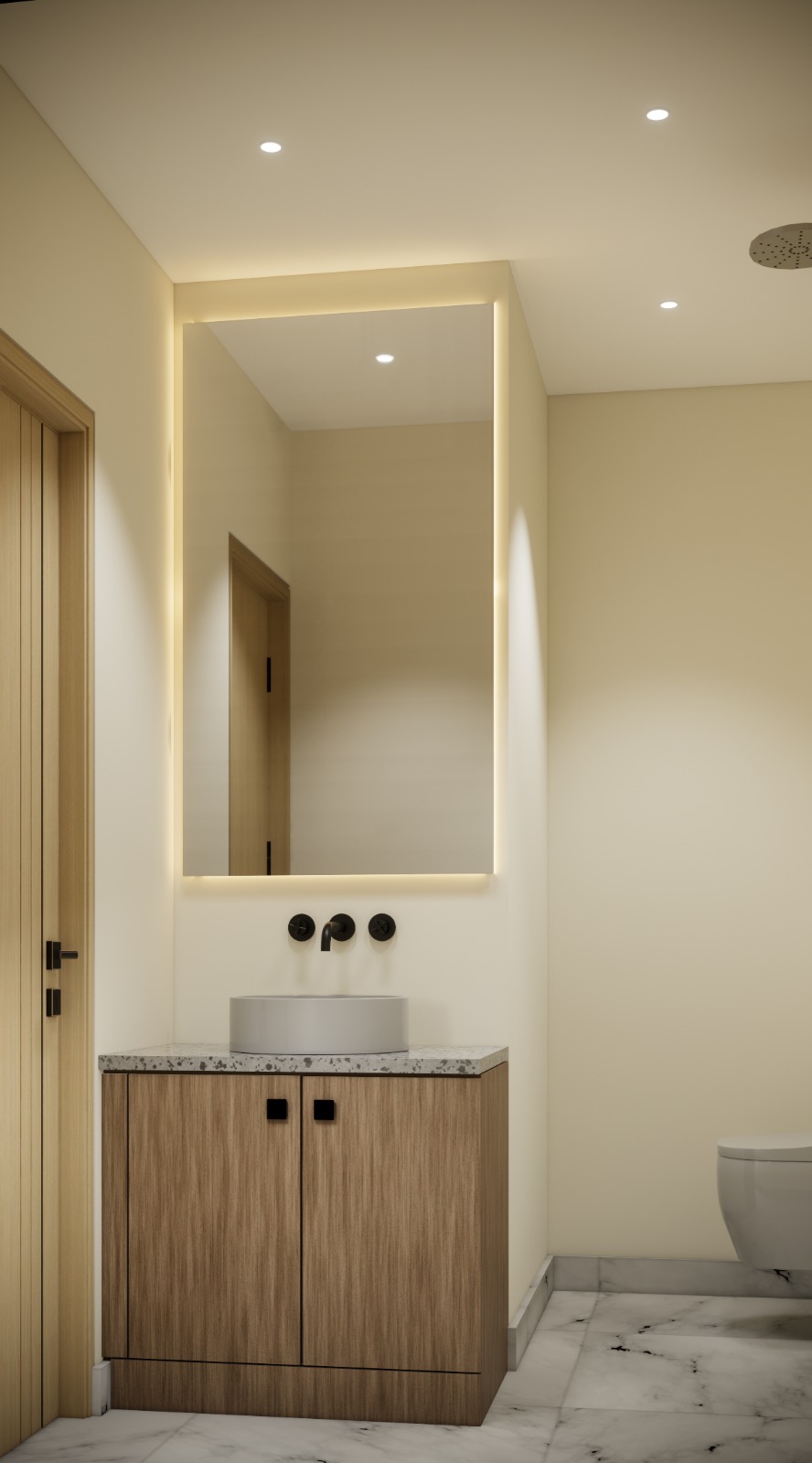 Luxury en-suite bathroom with backlit mirror